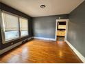 Spacious living room with hardwood floors and neutral walls at 880 Cascade Sw Rd, Atlanta, GA 30311