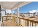 Expansive view from the balcony, showcasing the neighborhood and beautiful blue skies at 1230 Firefly Field Trce, Lawrenceville, GA 30045