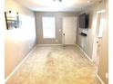 Spacious bonus room featuring neutral walls and carpet at 1957 Paxton Sw Dr, Lilburn, GA 30047