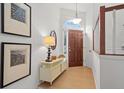 Welcoming entryway with stylish decor, a wooden door, and stairway to upper level at 1827 Rockridge Pl, Atlanta, GA 30324