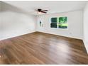 Spacious living room with hardwood floors and natural light showcasing open space at 30 N Cleveland Church Rd, Mcdonough, GA 30253