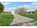 Long driveway leading to a house on a spacious lot at 3825 Green Ave, Loganville, GA 30052