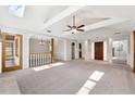Bright living room with high ceilings, hardwood floors, and lots of natural light at 3562 Ontario Ct, Buford, GA 30519