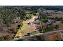 Expansive acreage showcases the home's secluded location and natural surroundings at 3625 Pointer Rd, Loganville, GA 30052
