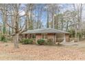 Brick ranch house with carport and ramp access at 4485 Canary Ct, Lithia Springs, GA 30122