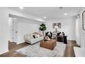 Cozy living room with hardwood floors, white walls, and modern decor at 3290 Ethan Dr, Marietta, GA 30062