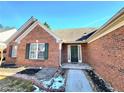 Front view of brick house with a welcoming entrance at 985 James Ridge Dr, Lawrenceville, GA 30045