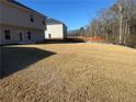 Large backyard with new sod, offering a peaceful and private setting at 333 Ormwell Dr, Social Circle, GA 30025