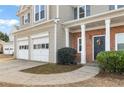 A close up exterior view of the two car garage and front door entrance at 2818 Colleton Dr, Marietta, GA 30066