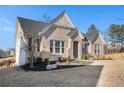 Beautiful brick home with well-maintained landscaping, a welcoming entrance and lovely curb appeal at 514 Perdue Trl, Canton, GA 30115