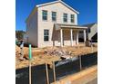 New construction two story home featuring a covered front porch and brick accents at 500 Aberdeen Meadow Ln, Acworth, GA 30102