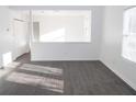 Bright living room with gray vinyl plank flooring and lots of natural light at 2655 Brandenberry Dr, Decatur, GA 30034