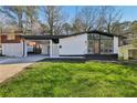 Newly renovated ranch home with carport and modern finishes at 2592 Baker Nw Rd, Atlanta, GA 30318