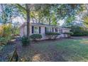 Light pink house with a tree-lined front yard at 3147 Canary Ct, Decatur, GA 30032