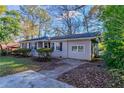 Charming ranch home featuring a spacious yard and driveway at 3147 Canary Ct, Decatur, GA 30032