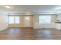 Bright living room featuring hardwood floors and lots of natural light at 1360 Lockhaven Sw Cir, Atlanta, GA 30311