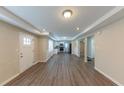Open concept living area with hardwood floors and kitchen view at 1360 Lockhaven Sw Cir, Atlanta, GA 30311