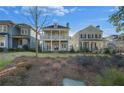 Two story house with a walkway and landscaping at 241 Thompson St, Alpharetta, GA 30009