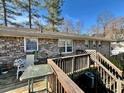 An upper wooden deck overlooking the backyard at 3928 Potomac Nw Dr, Kennesaw, GA 30144