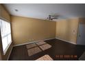 Spacious living room with hardwood floors and neutral walls at 7765 Haynes Park Cir, Lithonia, GA 30038