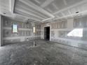 Bright living room with tray ceilings, awaiting personalized finishes to make it your own at 839 Braselton Hwy, Lawrenceville, GA 30043