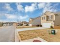 Houses with driveways and lawns in a residential neighborhood at 518 Firethorn Ct, Villa Rica, GA 30180