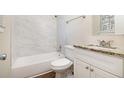 Updated bathroom with granite countertop and marble shower at 2751 Lloyd Rd, Decatur, GA 30034