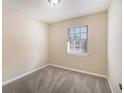Bright bedroom featuring neutral walls and carpet at 2751 Lloyd Rd, Decatur, GA 30034