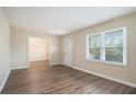 Open living area with hardwood floors and neutral walls at 1903 Meadow Ln, Decatur, GA 30032