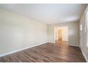 Spacious living area with hardwood floors and access to other rooms at 1903 Meadow Ln, Decatur, GA 30032