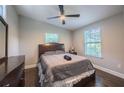 Cozy bedroom with dark wood furniture and plenty of natural light at 1390 Almont Sw Dr, Atlanta, GA 30310