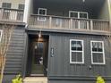 Modern two-story home, featuring board and batten siding and a covered balcony, located in a walkable neighborhood at 508 Zeal Se St # 292, Atlanta, GA 30315