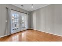 Hardwood floor dining area with balcony access at 308 Spring Heights Ln # 308, Smyrna, GA 30080