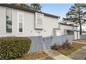 Gray siding townhome with private fenced yard at 257 Country Club Dr, Jonesboro, GA 30238