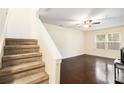 Spacious living room with hardwood floors and an abundance of natural light at 257 Country Club Dr, Jonesboro, GA 30238
