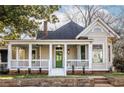 Craftsman home features a welcoming front porch and updated exterior at 359 Woodward Se Ave, Atlanta, GA 30312