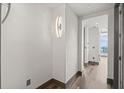 Hallway featuring hardwood floors, unique lighting, and neutral wall colors at 3630 Peachtree Ne Rd # 2207, Atlanta, GA 30326