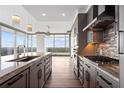 Well-appointed kitchen with stainless steel appliances and stunning city views at 3630 Peachtree Ne Rd # 2207, Atlanta, GA 30326
