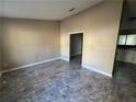 Spacious living room with tile flooring and access to kitchen and stairs at 3959 Wood Path Dr, Stone Mountain, GA 30083