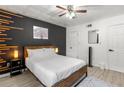 Cozy bedroom featuring a comfortable bed, modern decor, and ample closet space at 1225 Church St # O, Decatur, GA 30030