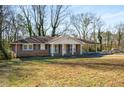 Ranch style home with mature trees and yard at 1801 Se Caribaea Se Trl, Atlanta, GA 30316