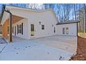 House exterior showcasing a patio and fenced yard at 1337 Fairfield Dr, Lilburn, GA 30047
