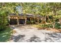 Ranch style home with stone facade and two-car garage at 1452 Merriman Ne Ln, Atlanta, GA 30324