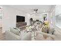 Living room with stylish furniture and hardwood floors at 1573 Deerwood Ln, Acworth, GA 30102