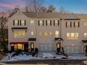Charming townhome with brick facade, black shutters, and inviting front entrance at 250 Lytham Se Dr, Mableton, GA 30126