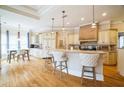 Spacious kitchen with island, custom cabinetry, and hardwood floors at 5473 Olde Plantation Dr, Douglasville, GA 30135