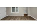 Bright living room with hardwood floors and neutral walls at 1454 Westridge Sw Rd, Atlanta, GA 30311