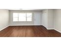 Spacious living room featuring hardwood floors and neutral walls at 2259 Nelms Sw Dr, Atlanta, GA 30315