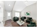 Living Room with green velvet couches and a marble coffee table at 1162 Misty Meadows Xing, Hampton, GA 30228