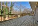 Spacious wooden deck overlooking backyard and trees at 3461 Valley View Dr, Marietta, GA 30068